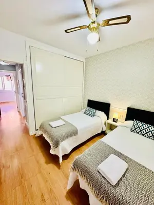 Cama o camas de una habitación en Apartamento Turístico Pizarro