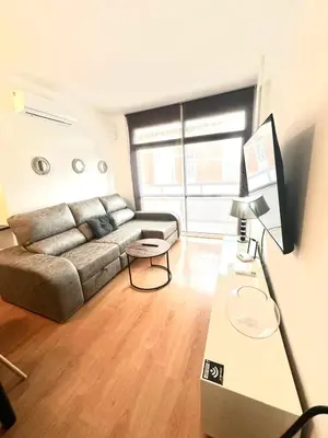 Una televisión o centro de entretenimiento en Apartamento Turístico Pizarro