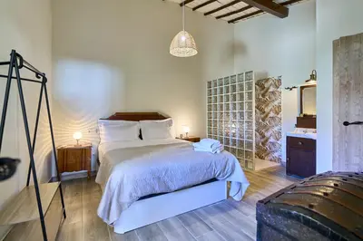 Cama o camas de una habitación en Casa Oliva by gaiarooms