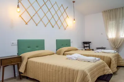 Cama o camas de una habitación en Apartamentos rurales ataecina