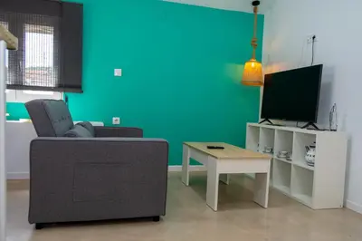 Una televisión o centro de entretenimiento en Apartamentos rurales ataecina