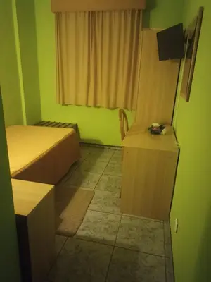 Una televisión o centro de entretenimiento en Hostal Villa María