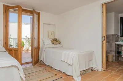 Cama o camas de una habitación en La Casa del Pasadizo elegante casona restaurada con piscina