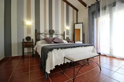 Cama o camas de una habitación en El Secadero