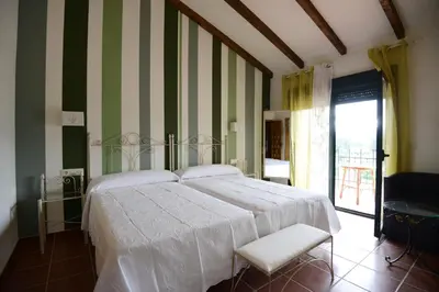 Cama o camas de una habitación en El Secadero