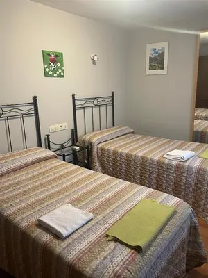 Cama o camas de una habitación en La Jelechera
