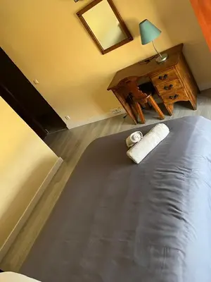 Cama o camas de una habitación en El encuentro