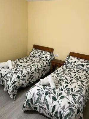 Cama o camas de una habitación en El encuentro