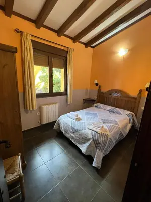 Cama o camas de una habitación en La Ondina del Madrigal