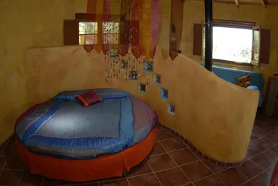Cama o camas de una habitación en Apartamentos Rurales Ecopangea