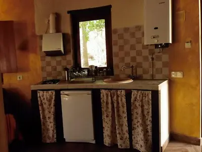 Una cocina o zona de cocina en Apartamentos Rurales Ecopangea