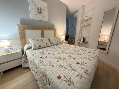 Cama o camas de una habitación en Apartamento Fama