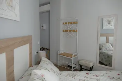 Cama o camas de una habitación en Apartamento Fama