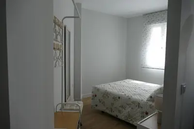 Cama o camas de una habitación en Apartamento Fama