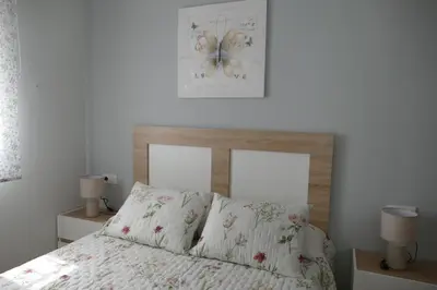 Cama o camas de una habitación en Apartamento Fama
