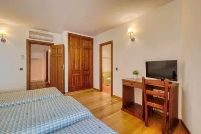 Cama o camas de una habitación en Casa Cuesta del Reloj