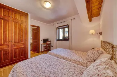 Cama o camas de una habitación en Casa Cuesta del Reloj
