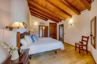 Cama o camas de una habitación en Casa Cuesta del Reloj
