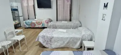 Cama o camas de una habitación en Serranos Salamanca Centro