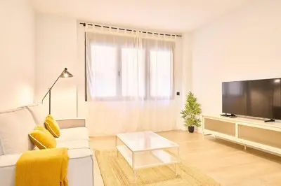 Una televisión o centro de entretenimiento en Suite Cañizal 32 Salamanca University Center