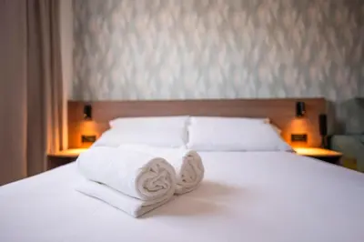 Cama o camas de una habitación en Alora Hotel Mérida
