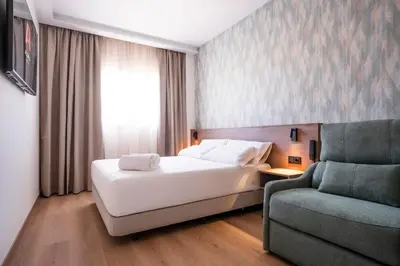 Cama o camas de una habitación en Alora Hotel Mérida