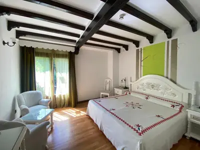 Cama o camas de una habitación en Hotel Doña Teresa