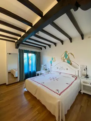 Cama o camas de una habitación en Hotel Doña Teresa