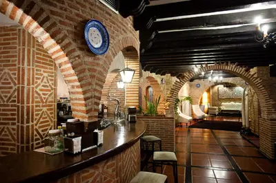 Un restaurante o sitio para comer en Hotel Doña Teresa
