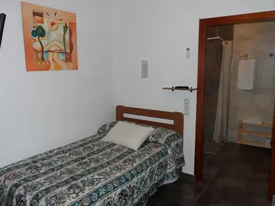 Cama o camas de una habitación en Hostal Via Del Caminante