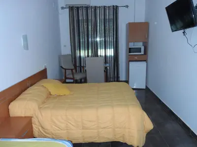 Cama o camas de una habitación en Hostal Via Del Caminante