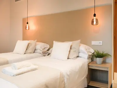 Cama o camas de una habitación en TAYP Navalmoral