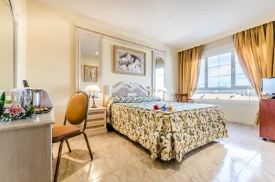 Cama o camas de una habitación en Roma Aurea