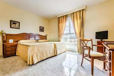 Cama o camas de una habitación en Roma Aurea