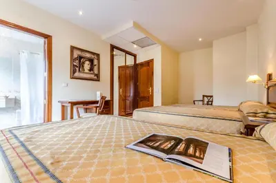Cama o camas de una habitación en Roma Aurea