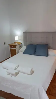 Cama o camas de una habitación en El hogar de Gregorio