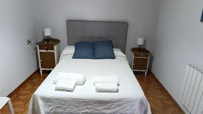Cama o camas de una habitación en El hogar de Gregorio