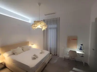Cama o camas de una habitación en Apartamento Loft Godoy Collection Luxury