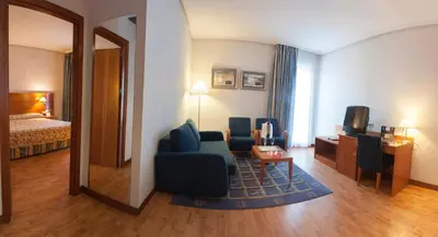 Cama o camas de una habitación en Extremadura Hotel