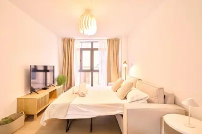 Zona de estar de Universitas Suite urban collection