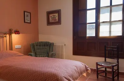 Cama o camas de una habitación en Casa de campo Olmo, jardín y piscina a 20 minutos de Salamanca
