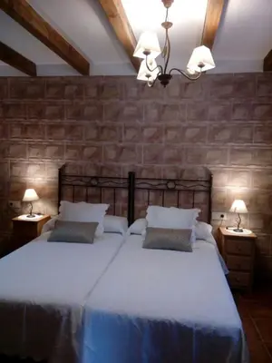 Cama o camas de una habitación en La Esquina de Animas