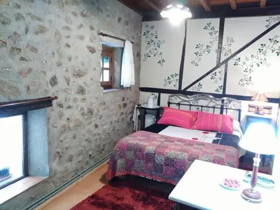 Cama o camas de una habitación en Antigua Posada, Valle del Jerte
