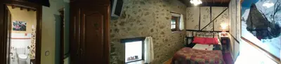 Una televisión o centro de entretenimiento en Antigua Posada, Valle del Jerte