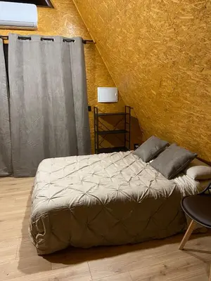 Cama o camas de una habitación en El Roble Glamping - Cabaña Alpina Familiar