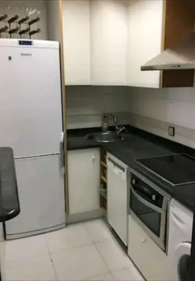 Una cocina o zona de cocina en Duplex con Garaje