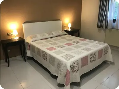 Cama o camas de una habitación en Duplex con Garaje