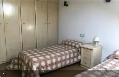 Cama o camas de una habitación en Duplex con Garaje