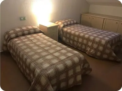 Cama o camas de una habitación en Duplex con Garaje