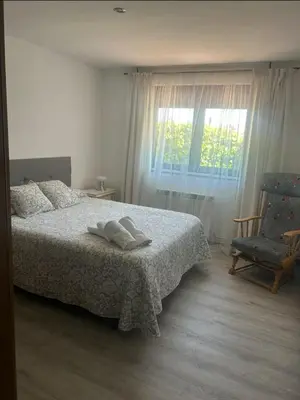 Cama o camas de una habitación en El jardín de las piedras